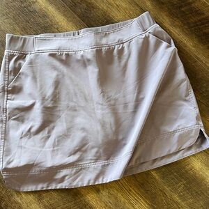 Purple skirt with shorts.